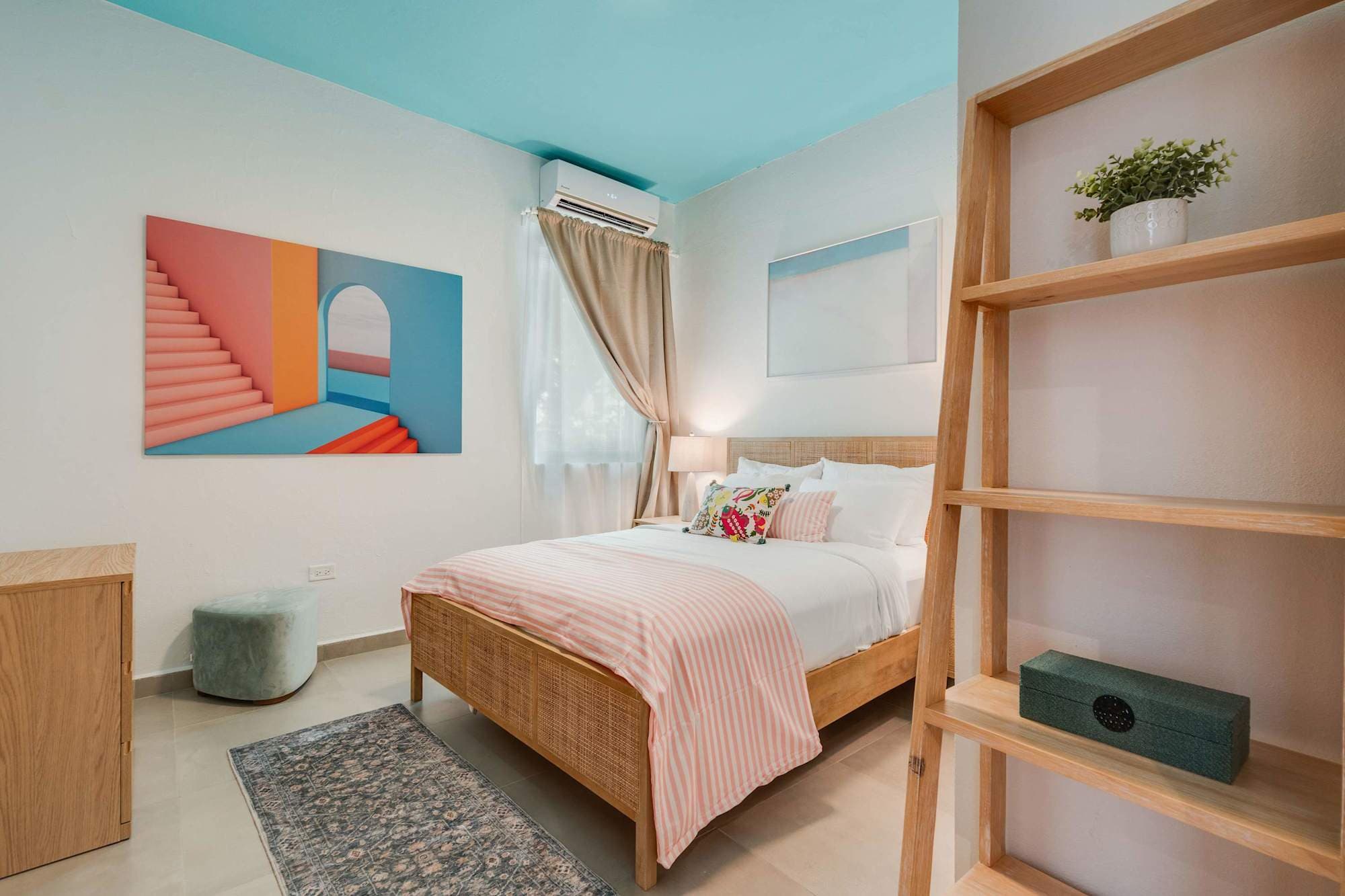 Queen bedroom with open shelving