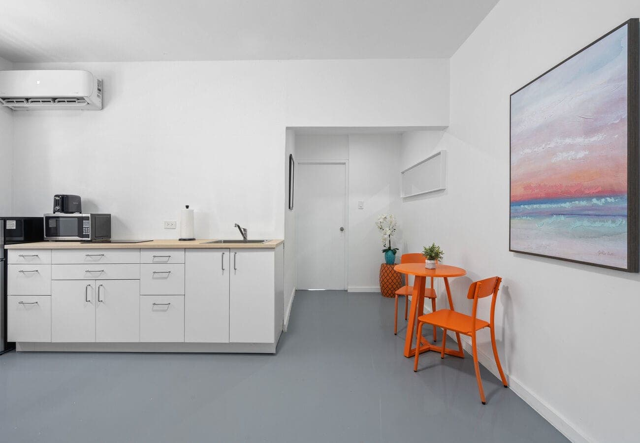 Kitchenette with cooktop, microwave & bistro table