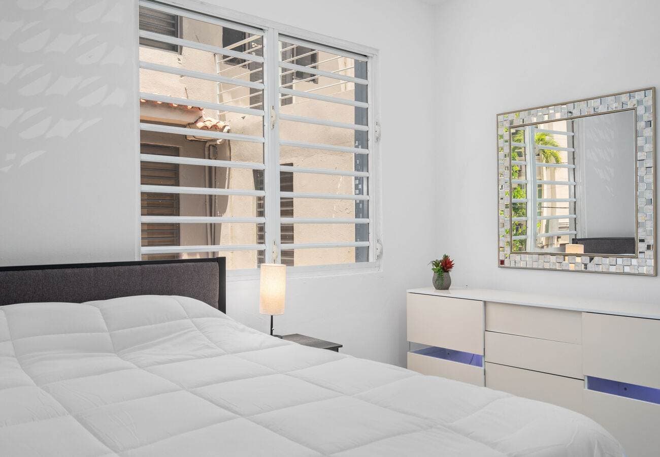 Queen bedroom with split A/C and window