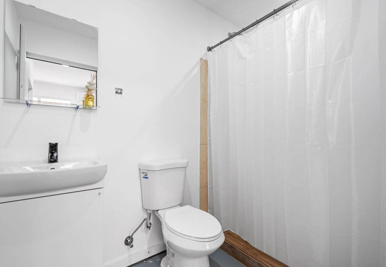 Full bathroom with shower & fresh toiletries