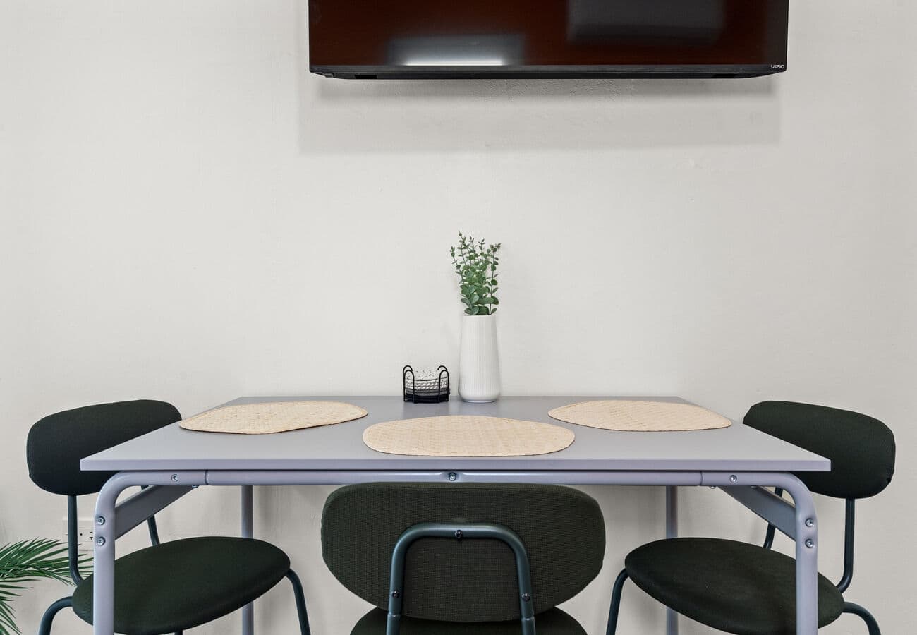 Dining table set for three