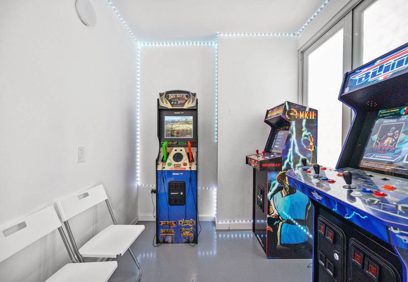 Shared arcade game room in the building – retro cabinets