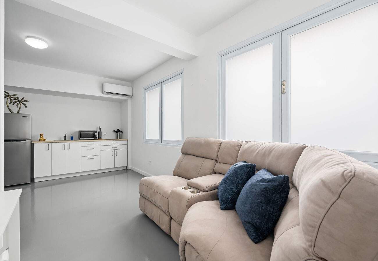 Living room with sectional sofa – Condado 2BR/2BA